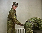 He spanks a soldier in OTK position, then releases a guy and orders him to jack off male twins spanking